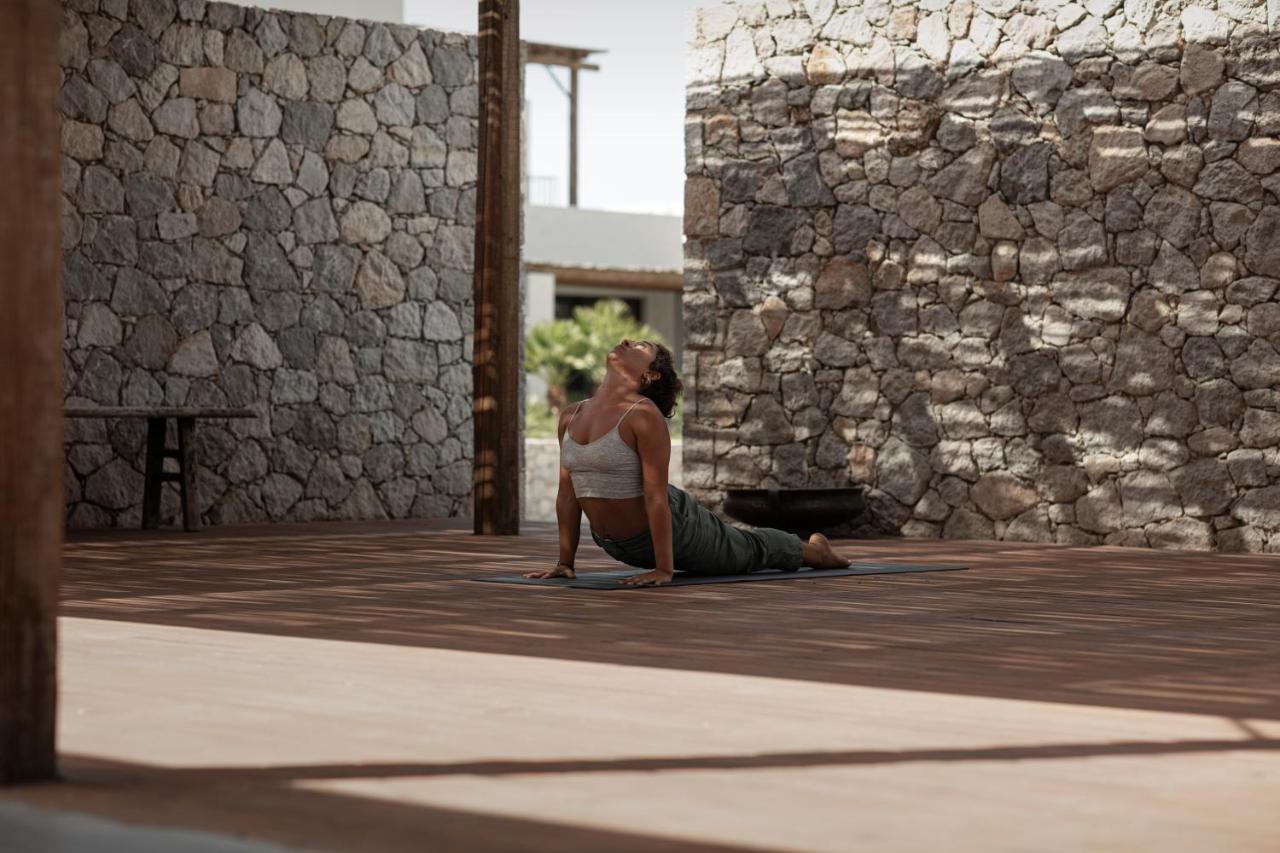 Hotel Oku Kos (Adults Only) Marmari  Esterno foto A woman practicing yoga at the hotel