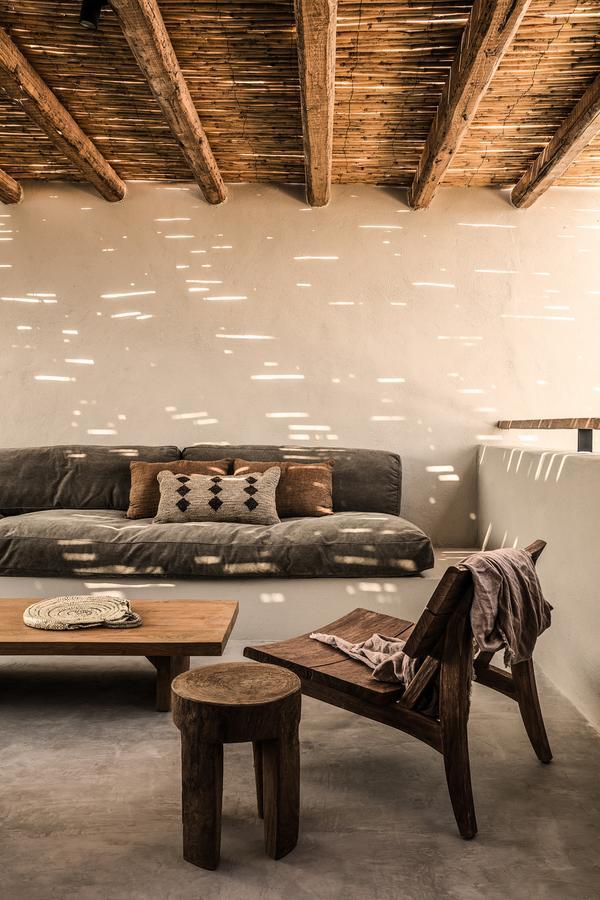 Hotel Oku Kos (Adults Only) Marmari  Esterno foto A living room with a stone wall